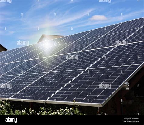 Solar Panels Under Blue Sky On Sunny Day Alternative Energy Source