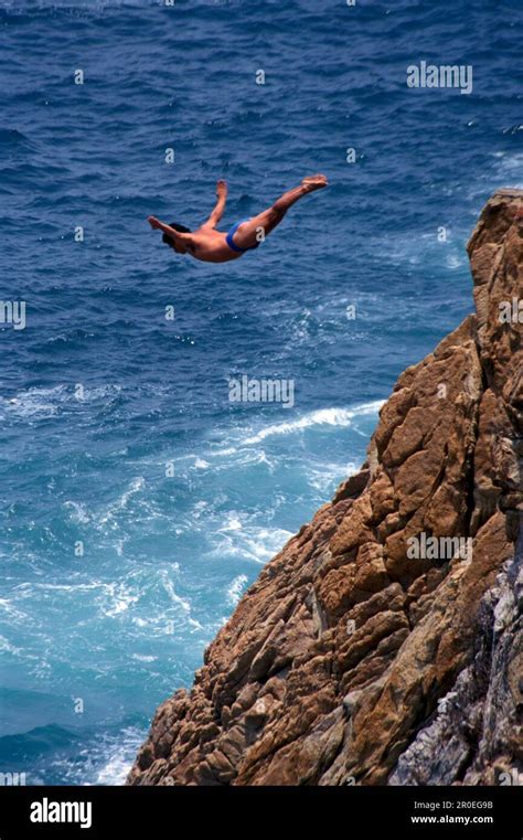 Cliff Diver During Jump Acapulco Guerrero Mexico America Stock