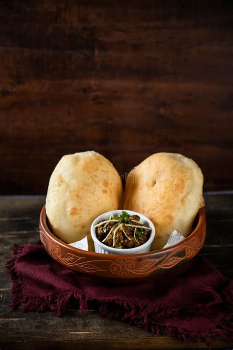 Chole Bhature Or Channay Pathuray And Puri Served In Dish Isolated On