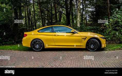 Yellow BMW M4 Stock Photo Alamy