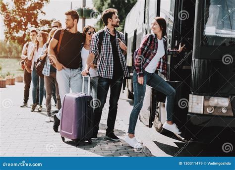 Group Of Young People Boarding On Travel Bus Stock Image Image Of