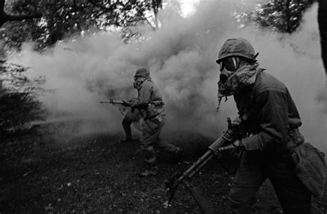 Security Policemen Dressed In Nuclear Biological And Chemical