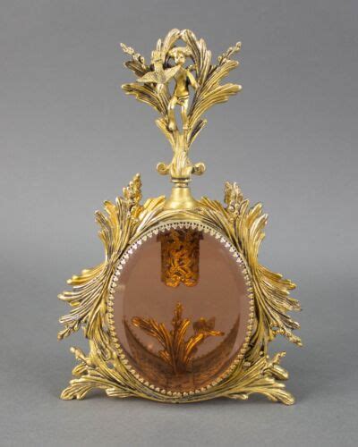 Ormolu Gold Filigree Angel Cherub Holding Bird Amber Glass Vanity