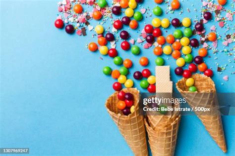 Rainbow Swirl Ice Cream Cone Photos And Premium High Res Pictures