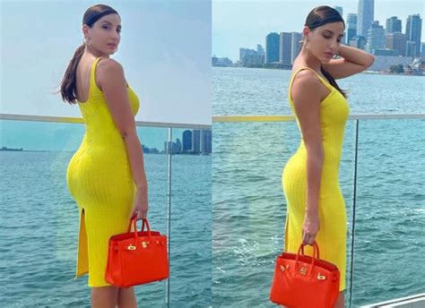 Nora Fatehi Sizzles In Bright Yellow Dress Along With Uber Luxurious