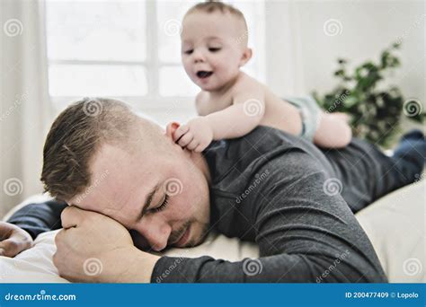 Tired Father Sleep But His Baby Boy Interferes Him Young Happy Father