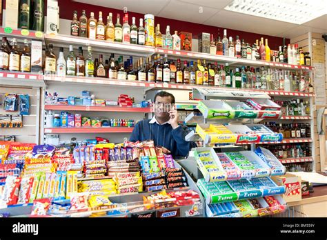 Indian Off Licence Owner In His Corner Shop London England Uk Stock