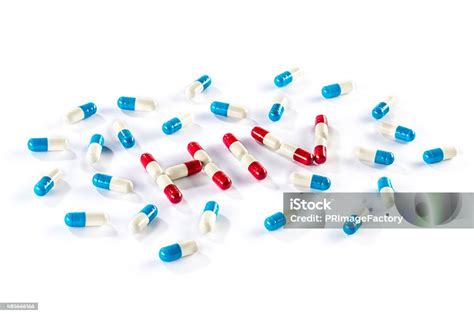 Red Capsule And Blue Capsule In Hiv Word Stock Photo Download Image