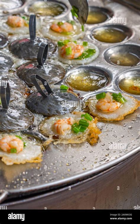 Vietnamese Tiny Sizzled Shrimp Pancake At Street Food Vendor Stock