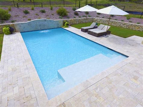 Geometric Pool With Sheer Descent And Tanning Ledge Swimming Pool