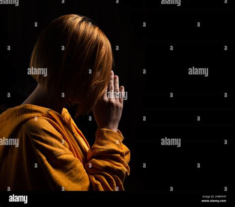 Caucasian Woman With Head Bowed And Praying Hi Res Stock Photography