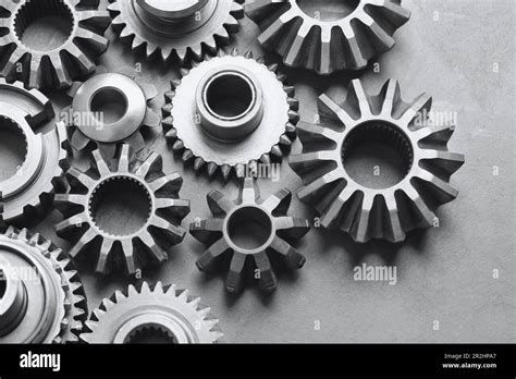 Different Stainless Steel Gears On Light Grey Background Above View