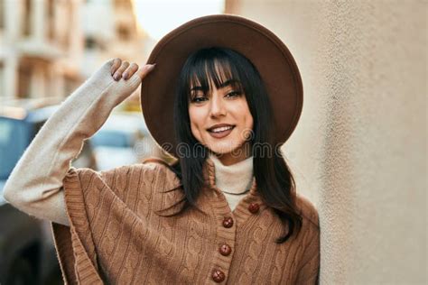 Brunette Woman Wearing Winter Hat Smiling Outdoors At The City Stock Photo Image Of Expression