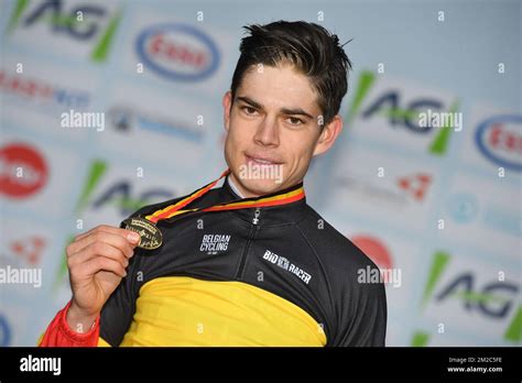 Belgian Wout Van Aert Celebrates On The Podium After Winning The Men S