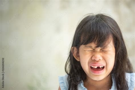 Asian Girl Crying With Tears On Face In Sadness Situation Stock Photo