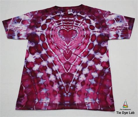 A Red And Purple Tie Dye Shirt With A Heart In The Center On Its Chest