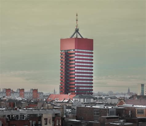 Premium Photo Red Tall Office Building In City Center Geometric