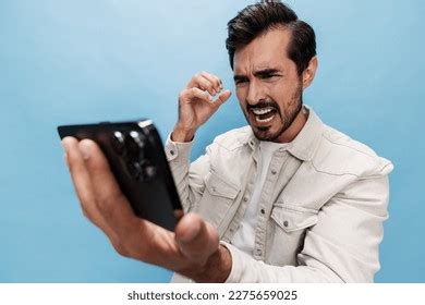 Portrait Stylish Brunette Man Looking Phone Stock Photo 2275659025