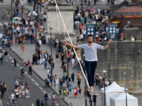 French Tightrope Walker Crosses 600 Metre Stretch From Eiffel Tower