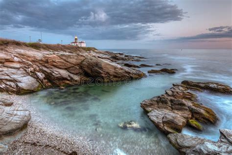 Faro De Beavertail En La Puesta Del Sol Foto De Archivo Imagen De