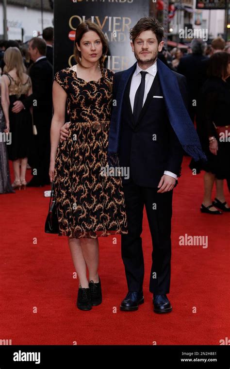 Actors Zoe Grisedale Left And Iwan Rheon Pose For Photographers Upon