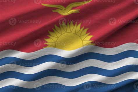 Kiribati Flag With Big Folds Waving Close Up Under The Studio Light