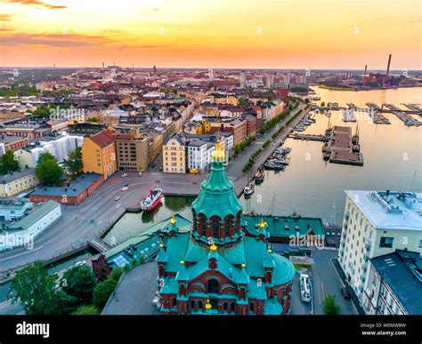 Aerial view of beautiful Helsinki at sunset. Blue sky and clouds and ...