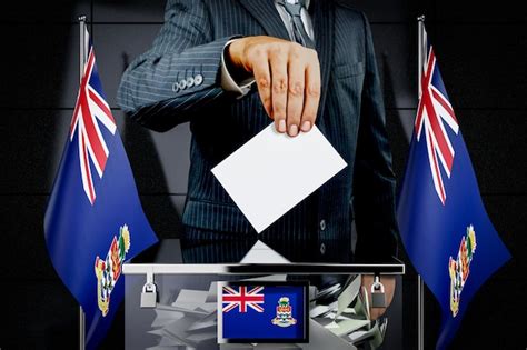 Premium Photo The Cayman Islands Flags Hand Dropping Voting Card