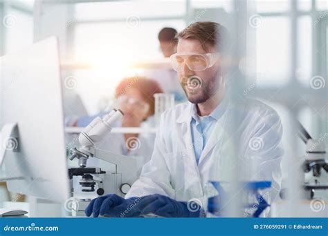 In A Modern Laboratory Research Scientist Conducts Experiments Stock