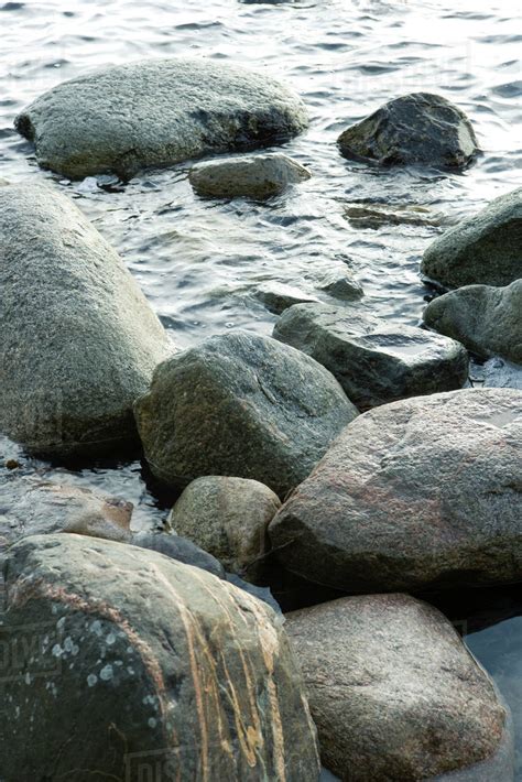 Rocks In Water Stock Photo Dissolve