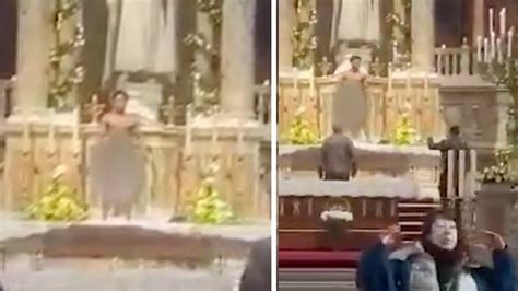 Hungary Nigerian Migrants Strips Naked And Climbs Onto Altar Inside St