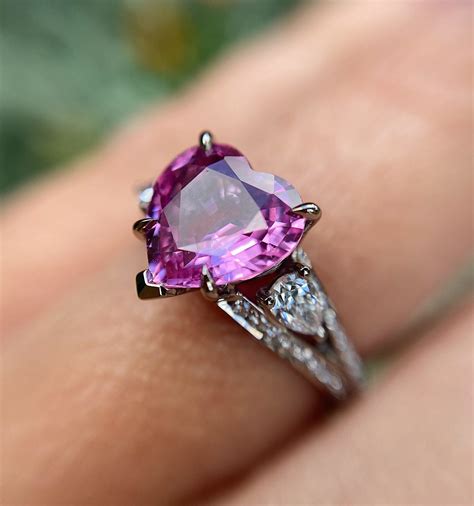 18ct White Gold Pink Sapphire Heart Ring With Diamond Shoulder Detail