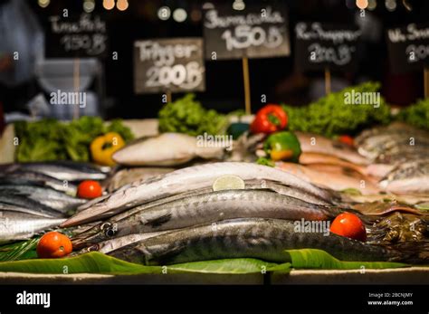 Fresh Fish With Price Tag Being Sold On A Stall At Thailand Night