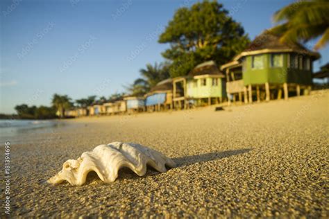 Samoa beach with fale bungalow sunrise Stock Photo | Adobe Stock