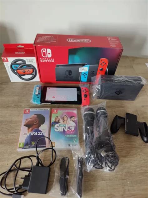 Nintendo Switch Go Console Avec Paire De Joy Con Bleu Rouge Eur