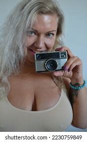Laughing Blonde Woman Sexy Girl Holding Stock Photo 2230759849