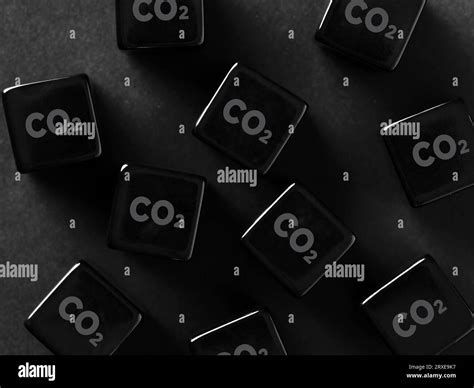 Environmental Pollution And Carbon Emission Concept Co2 Carbon Dioxide Symbol On Black Cubes