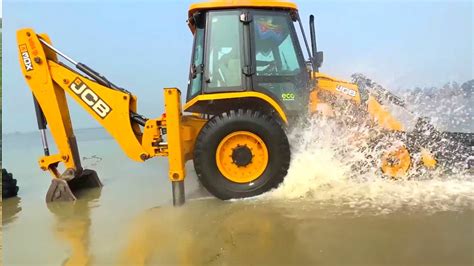 Jcb Dx Machine Loading Red Mud In Mahindra And Swaraj Tractor Jcb