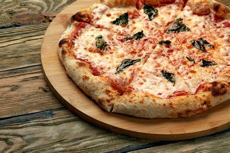 Whole Neapolitan Pizza Served On Wooden Board Stock Photo Image Of