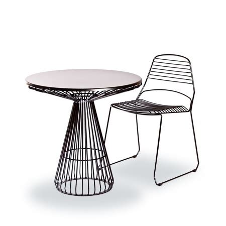 The Jil Dining Table With The Jak Chair Designed By Justin Hutchinson