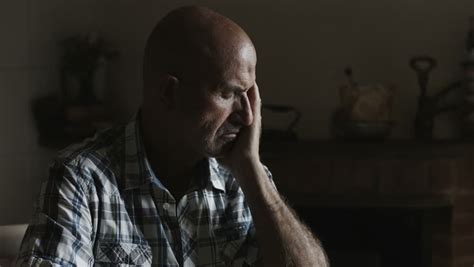 Thoughtful Old Man Sitting Alone Near A Window Pensive Aged Man Sad