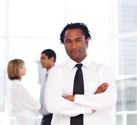 Premium Photo African Businessman With Folded Arms