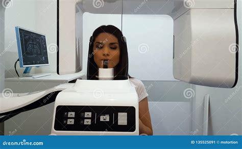 Panoramic X-ray Machine in Dentistry Clinic, Female Patient Undergoing Procedure Stock Image ...