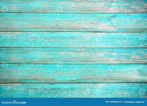 Old Weathered Wooden Plank Painted In Turquoise Or Blue Sea Color