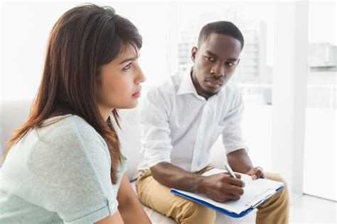 Serious Therapist Listening To His Talking Patient Stock Photos - Free ...