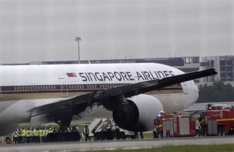 Singapore Airlines A Boeing 777 Catches Fire While Tow Trucks Towing