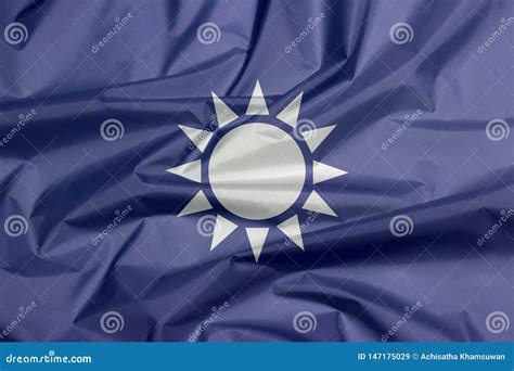 Fabric Flag of Kuomintang. a White Sun with Twelve Rays on Blue Stock ...