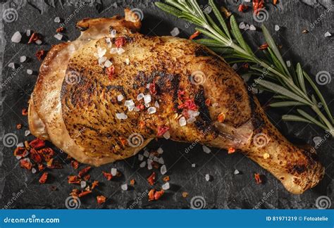 Chicken Leg Roasted Over Black Background View From Above Stock Image