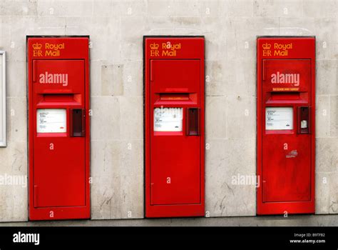 Three royal mail post boxes Stock Photo - Alamy