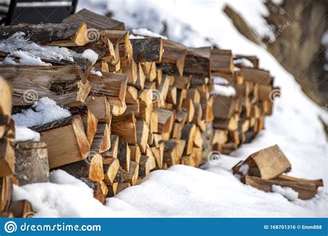 Woodpile Of Firewood In The Snow Closeup Stock Photo Image Of Ecology